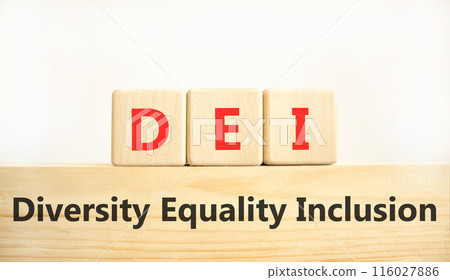 DEI diversity equality inclusion symbol. Concept words DEI diversity equality inclusion on blocks. Beautiful white background. Business DEI diversity equality inclusion concept. Copy space. DEI diversity equality inclusion symbol. Concept words DEI diversity equality inclusion on blocks. Beautiful white background. Business DEI diversity equality inclusion concept. Copy space. 116027886