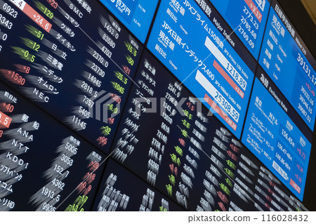 Blue digital multi-display showing stock charts Blue digital multi-display showing stock charts 116028432
