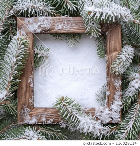 Adding a serene winter charm to your decor, a wooden frame is embraced by the tranquility of snowy pine branches Adding a serene winter charm to your decor, a wooden frame is embraced by the tranquility of snowy pine branches 116029114