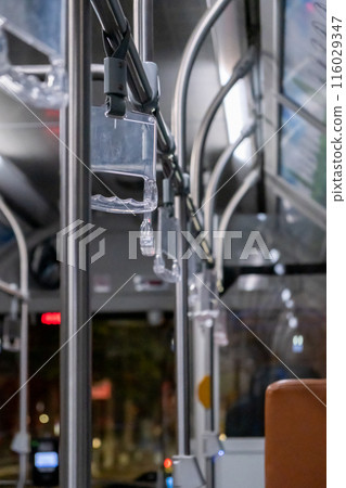 Interior view of the bus with hand grip, in Bangkok, Thailand Interior view of the bus with hand grip, in Bangkok, Thailand 116029347