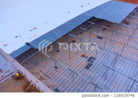 Building of steel structure during construction of warehouse. 116029746