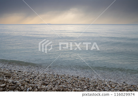 Calm sea and island Ereikousa, Greece 116029974