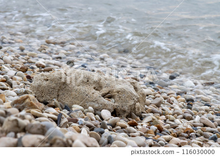 Bigger stone and pebbles on the coast, Acharavi, Corfu, Greece 116030000