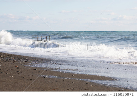 Stormy lwaves on the beach of Sochi, Russia, Black Sea 116030971
