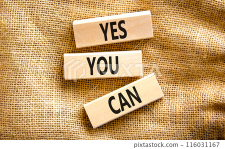 Motivational and Yes you can symbol. Concept words Yes you can on beautiful wooden blocks. Beautiful canvas table canvas background. Business motivational and Yes you can concept. Copy space. Motivational and Yes you can symbol. Concept words Yes you can on beautiful wooden blocks. Beautiful canvas table canvas background. Business motivational and Yes you can concept. Copy space. 116031167