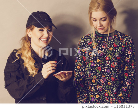 Security guard and blonde girl 116031373