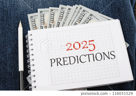 Business concept. Copy space.2025 predictions symbol on a checkered notebook in a composition with dollars bills and a pencil Business concept. Copy space.2025 predictions symbol on a checkered notebook in a composition with dollars bills and a pencil 116031529