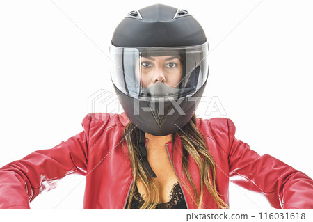 Beautiful young woman in protective motorcycle helmet in studio. Power woman concept 116031618