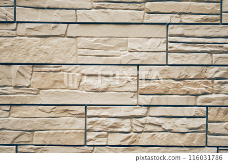The texture of the stone. Uneven tiles with protruding parts and cracks. With space to copy. High quality photo 116031786
