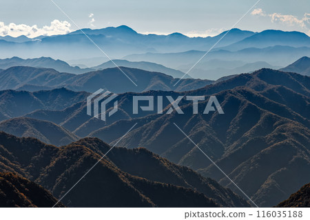 The Tanzawa mountain range as seen from Mt. Kasatori in Okuchichibu The Tanzawa mountain range as seen from Mt. Kasatori in Okuchichibu 116035188