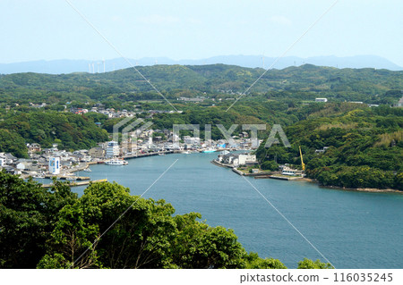 View from the observation deck at Kaze no Mieru Oka Park in Yobuko, Karatsu City, Saga Prefecture. Yobuko Port and the Genkai Sea. 116035245