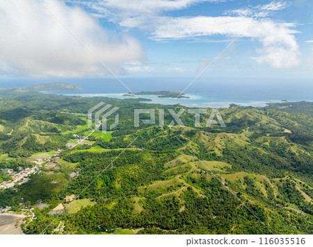 Island with green forest and hills. Agricultural land in Santa Fe, Tablas, Romblon. Philippines. 116035516