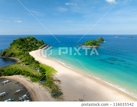 Beaches with boats and cream colored sands with ocean waves. El Nido, Palawan. Philippines. Beaches with boats and cream colored sands with ocean waves. El Nido, Palawan. Philippines. 116035542