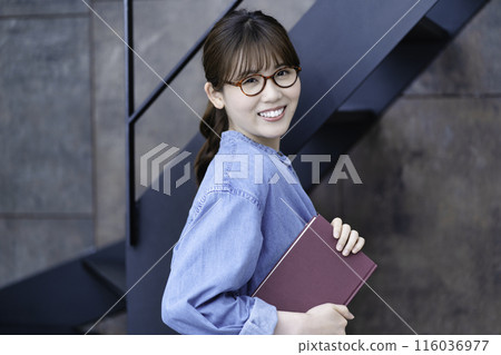 Casual woman with a favorite book Casual woman with a favorite book 116036977