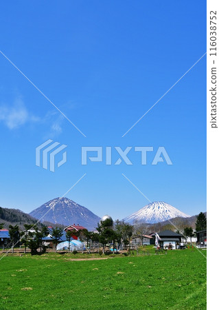 The twin Yotei peaks seen from the Kimobetsu Nakazato Viewpoint Parking The twin Yotei peaks seen from the Kimobetsu Nakazato Viewpoint Parking 116038752