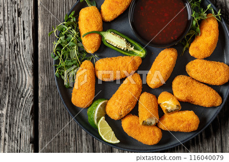 crispy baked cream cheese stuffed jalapeno poppers crispy baked cream cheese stuffed jalapeno poppers 116040079