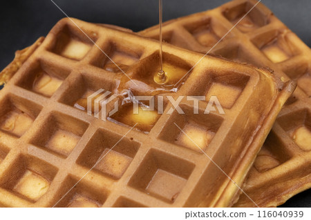Waffles, making Western sweets, American waffles, pouring syrup Waffles, making Western sweets, American waffles, pouring syrup 116040939