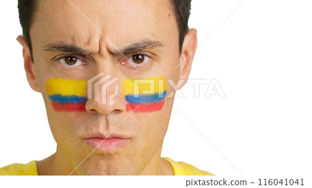 Serious man with a colombian flag painted on the face 116041041