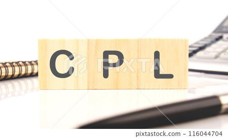 CPL Cost Per Lead word written on wooden cubes in a composition with a calculator, a pen and a fragment of a notebook 116044704
