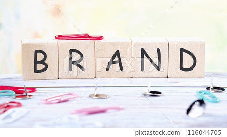 Customer retention concept. BRAND it is made of wooden cubes on a colored background 116044705