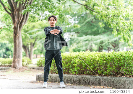 Young Asian man stretching, warming up and warming up before exercise 116045854