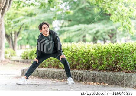 Young Asian man bending, stretching, warming up, warming up before exercise 116045855