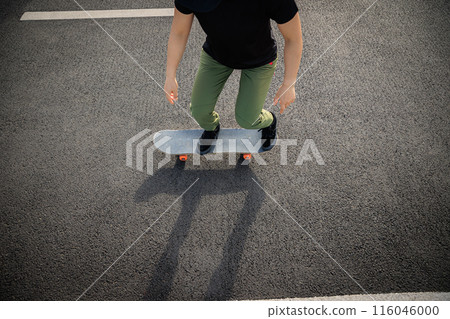 Skateboarder skateboarding outdoors in city 116046000