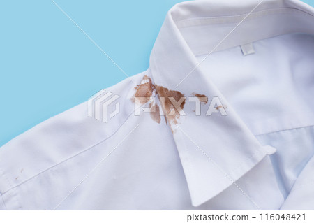 Dirty choclate stain on white shirt Dirty choclate stain on white shirt 116048421