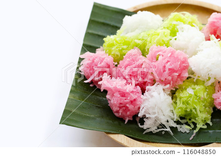 Sweet coconut balls, crispy coconut candies (Maprao Gaew). Thai traditional dessert 116048850