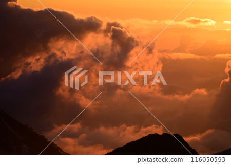 Clouds and sky dyed in the setting sun as seen from Tsurugi-Gozen 116050593