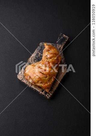 Delicious grilled chicken leg or quarter with salt and spices 116050919