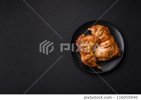 Delicious grilled chicken leg or quarter with salt and spices Delicious grilled chicken leg or quarter with salt and spices 116050940