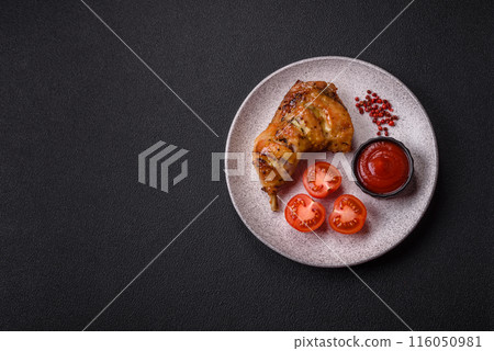 Delicious grilled chicken leg or quarter with salt and spices Delicious grilled chicken leg or quarter with salt and spices 116050981