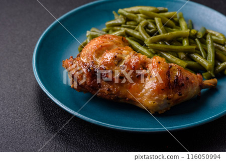 Delicious grilled chicken leg or quarter with salt and spices 116050994