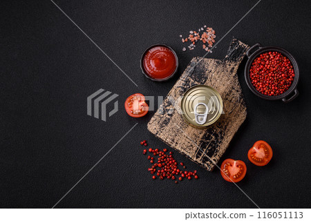 Round metal can with canned meat or fish with a key 116051113