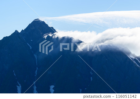 The majestic Mount Tsurugi with clouds passing by The majestic Mount Tsurugi with clouds passing by 116051142