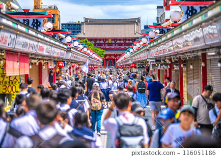 Tokyo cityscape in Japan: Senso-ji Temple in the morning crowded with tour groups, children, and foreign tourists on May 30th 116051186