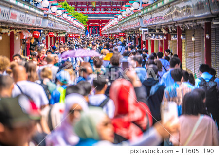 Tokyo cityscape in Japan: Senso-ji Temple in the morning crowded with tour groups, children, and foreign tourists on May 30th 116051190