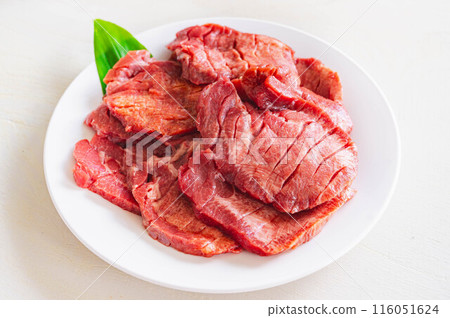 Beef tongue served on a plate 116051624
