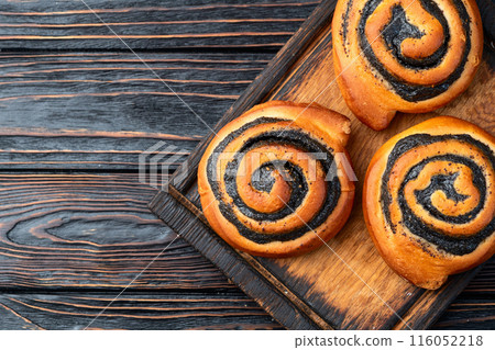 Homemade bun with poppy seeds 116052218