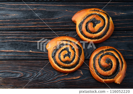 Homemade bun with poppy seeds Homemade bun with poppy seeds 116052220