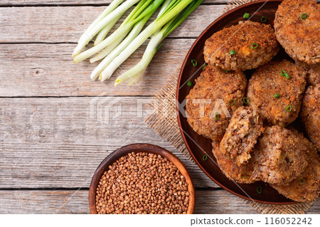 Healthy vegetarian food background photo . Fried buckwheat cutlets 116052242