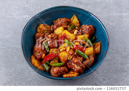 fried chicken with pineapple in sweet and sour sauce fried chicken with pineapple in sweet and sour sauce 116052737