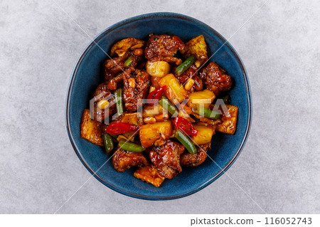 fried chicken with pineapple in sweet and sour sauce 116052743