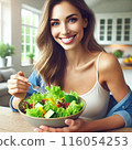 A young woman eating a salad 116054253