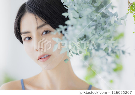 Woman in blue camisole 116055207