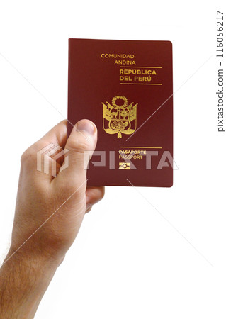 Man's hand holding a Peruvian passport 116056217