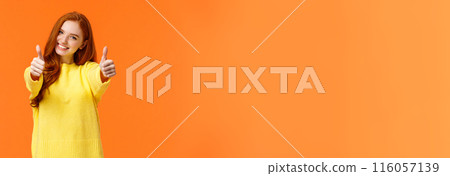 Good luck. Optimistic, confident cute redhead girlfriend encourage you, giving thumbs-up in like or approval, smiling rate excellent movie or product, give positive feedback, recomment, orange wall 116057139