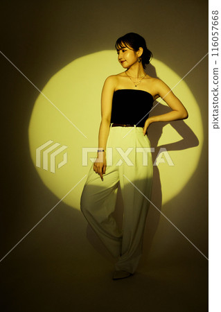 Female portrait using light and shadow color lighting Female portrait using light and shadow color lighting 116057668