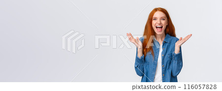 Cheerful, happy and optimistic alluring redhead teenage girl clap hands and laughing from amazement, having fun, enjoy watching funny stand-up comedy performance, white background 116057828
